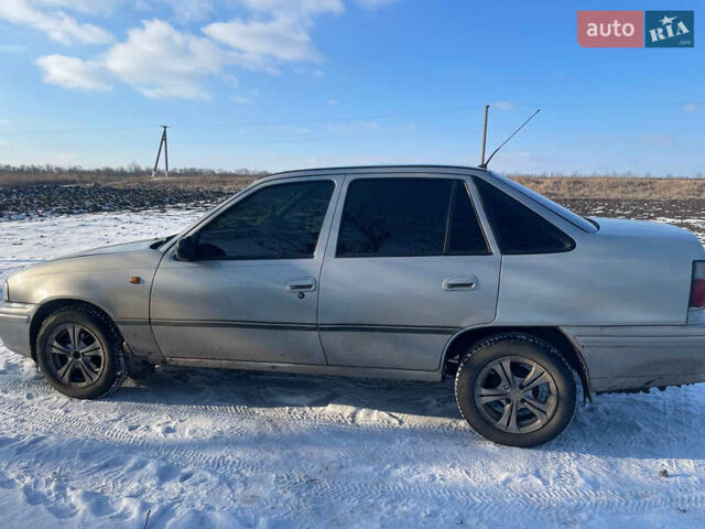 Серый Дэу Нексия, объемом двигателя 1.5 л и пробегом 230 тыс. км за 1800 $, фото 2 на Automoto.ua