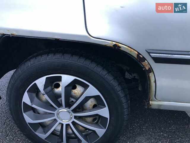 Сірий Деу Нексія, об'ємом двигуна 1.5 л та пробігом 330 тис. км за 1650 $, фото 23 на Automoto.ua