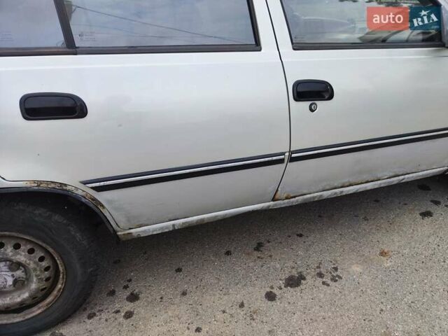 Сірий Деу Нексія, об'ємом двигуна 1.5 л та пробігом 221 тис. км за 1195 $, фото 2 на Automoto.ua