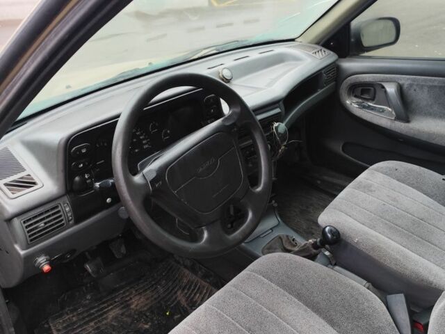 Сірий Деу Нексія, об'ємом двигуна 1.5 л та пробігом 200 тис. км за 800 $, фото 7 на Automoto.ua