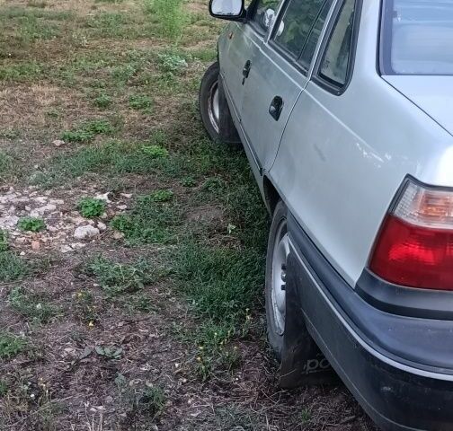 Серый Дэу Нексия, объемом двигателя 1.5 л и пробегом 335 тыс. км за 1194 $, фото 4 на Automoto.ua