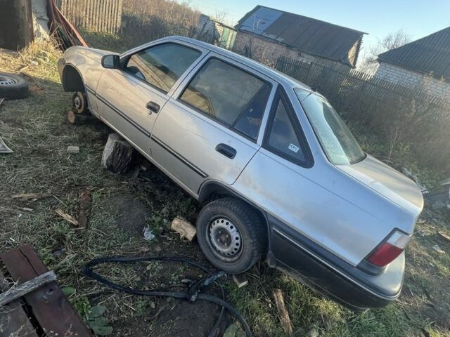 Сірий Деу Нексія, об'ємом двигуна 1.5 л та пробігом 77 тис. км за 566 $, фото 3 на Automoto.ua