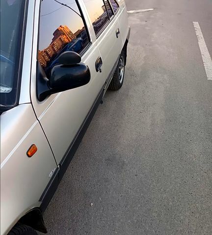 Сірий Деу Нексія, об'ємом двигуна 15 л та пробігом 317 тис. км за 2000 $, фото 1 на Automoto.ua