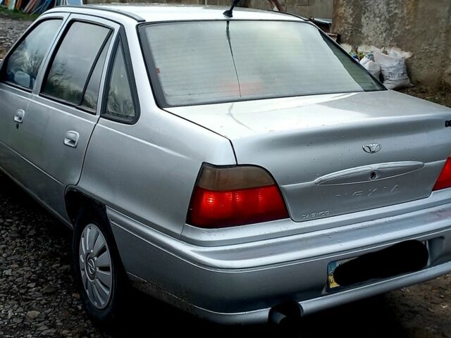 Серый Дэу Нексия, объемом двигателя 1.5 л и пробегом 100 тыс. км за 925 $, фото 3 на Automoto.ua