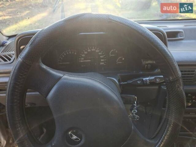 Сірий Деу Нексія, об'ємом двигуна 1.6 л та пробігом 400 тис. км за 1200 $, фото 8 на Automoto.ua