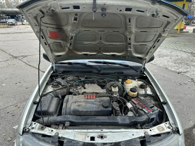 Сірий Деу Нексія, об'ємом двигуна 1.5 л та пробігом 199 тис. км за 1900 $, фото 16 на Automoto.ua