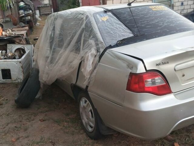 Сірий Деу Нексія, об'ємом двигуна 1.5 л та пробігом 100 тис. км за 1000 $, фото 4 на Automoto.ua