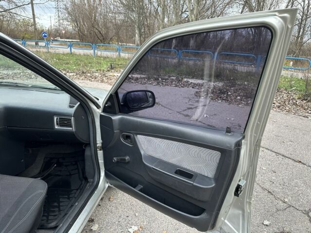 Сірий Деу Нексія, об'ємом двигуна 1.5 л та пробігом 199 тис. км за 1900 $, фото 9 на Automoto.ua