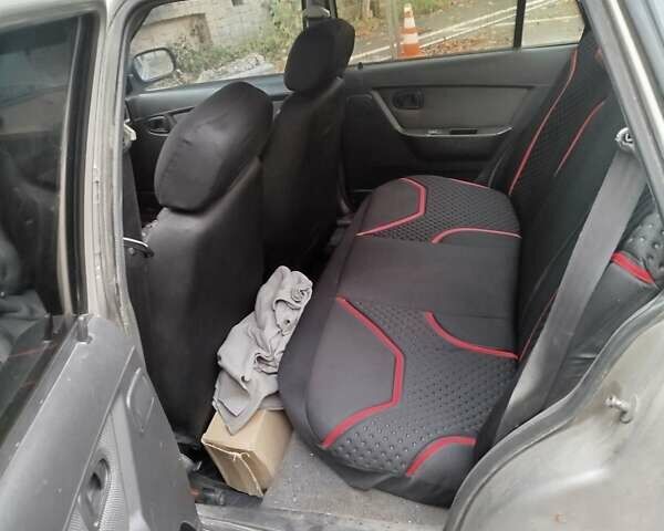 Серый Дэу Нексия, объемом двигателя 1.6 л и пробегом 213 тыс. км за 1666 $, фото 1 на Automoto.ua