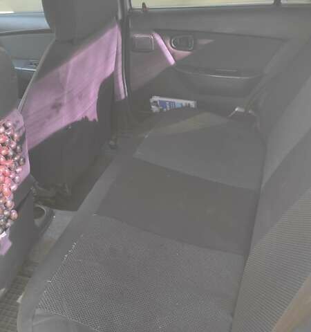 Сірий Деу Нексія, об'ємом двигуна 1.5 л та пробігом 215 тис. км за 2000 $, фото 7 на Automoto.ua