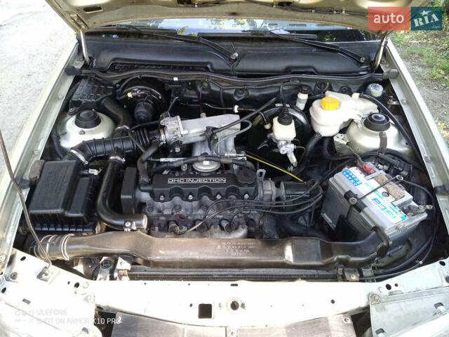 Сірий Деу Нексія, об'ємом двигуна 1.5 л та пробігом 181 тис. км за 2600 $, фото 5 на Automoto.ua