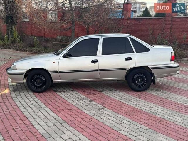 Сірий Деу Нексія, об'ємом двигуна 1.6 л та пробігом 249 тис. км за 1350 $, фото 5 на Automoto.ua