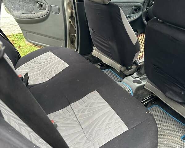 Сірий Деу Нексія, об'ємом двигуна 1.5 л та пробігом 246 тис. км за 2350 $, фото 4 на Automoto.ua