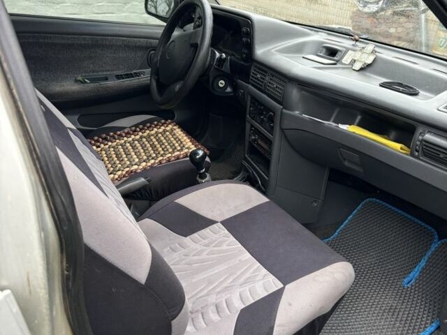 Сірий Деу Нексія, об'ємом двигуна 1.5 л та пробігом 246 тис. км за 2350 $, фото 2 на Automoto.ua