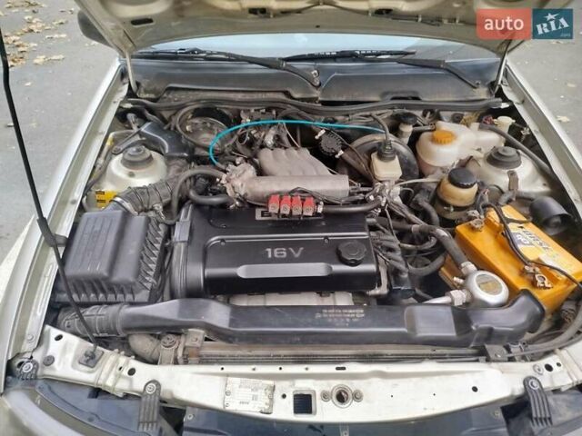 Серый Дэу Нексия, объемом двигателя 1.6 л и пробегом 213 тыс. км за 1666 $, фото 2 на Automoto.ua