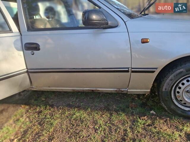 Сірий Деу Нексія, об'ємом двигуна 1.6 л та пробігом 400 тис. км за 1200 $, фото 2 на Automoto.ua