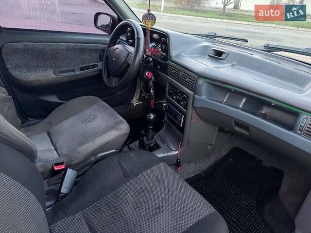 Сірий Деу Нексія, об'ємом двигуна 1.6 л та пробігом 249 тис. км за 1350 $, фото 9 на Automoto.ua