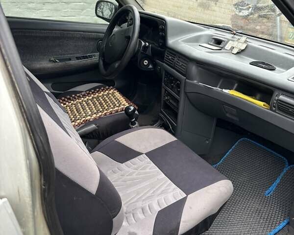 Сірий Деу Нексія, об'ємом двигуна 1.5 л та пробігом 246 тис. км за 2350 $, фото 2 на Automoto.ua