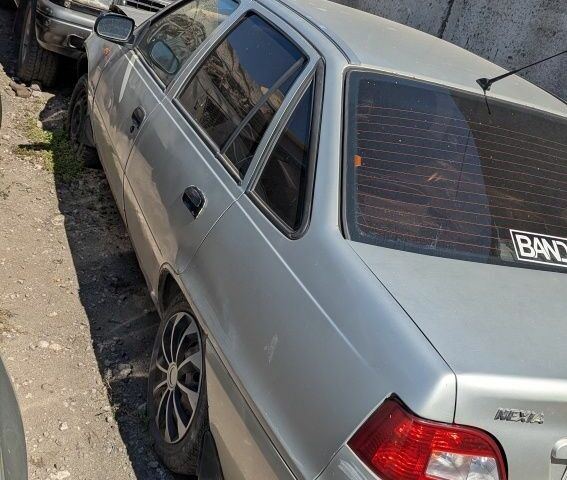 Серый Дэу Нексия, объемом двигателя 1.5 л и пробегом 198 тыс. км за 477 $, фото 1 на Automoto.ua