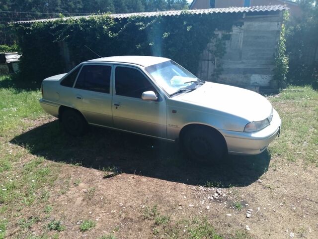 Сірий Деу Нексія, об'ємом двигуна 1.5 л та пробігом 171 тис. км за 2100 $, фото 4 на Automoto.ua