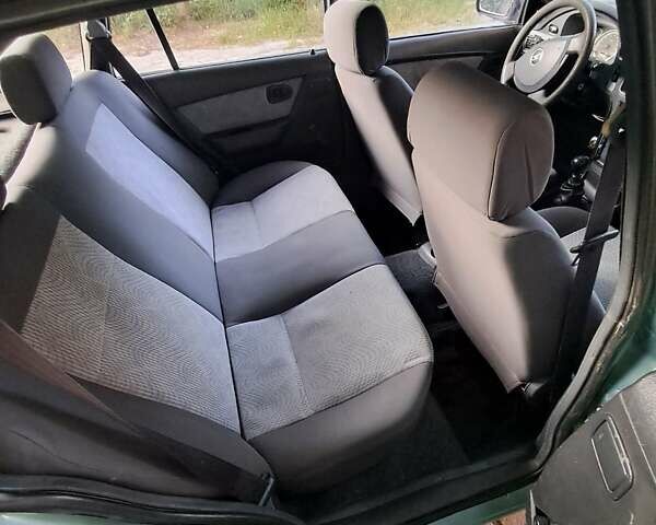 Серый Дэу Нексия, объемом двигателя 1.5 л и пробегом 122 тыс. км за 1600 $, фото 2 на Automoto.ua