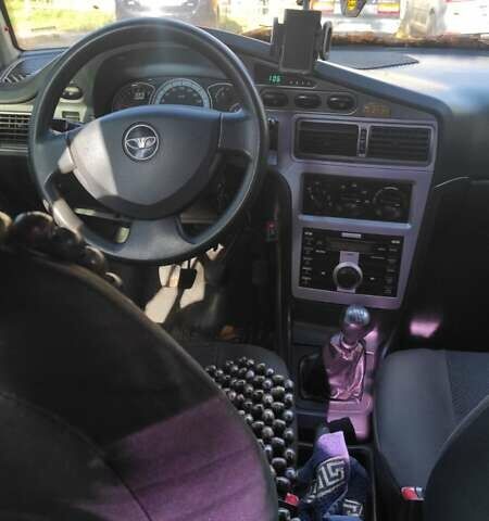 Сірий Деу Нексія, об'ємом двигуна 1.5 л та пробігом 215 тис. км за 2000 $, фото 5 на Automoto.ua