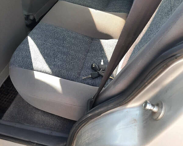 Сірий Деу Нексія, об'ємом двигуна 1.5 л та пробігом 170 тис. км за 1800 $, фото 4 на Automoto.ua