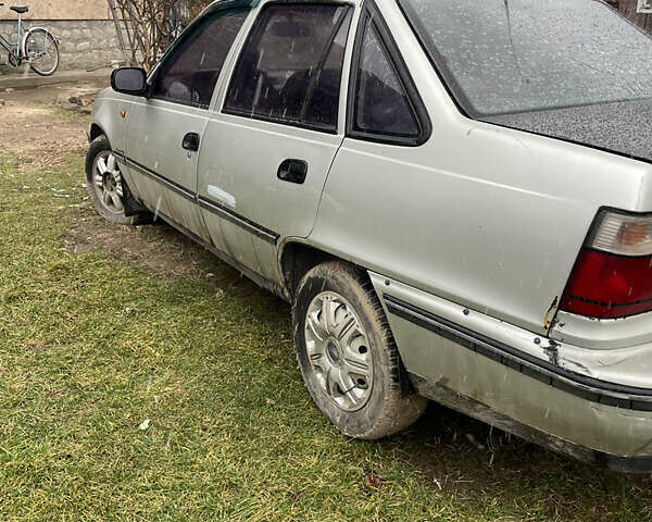 Сірий Деу Нексія, об'ємом двигуна 1.5 л та пробігом 228 тис. км за 1350 $, фото 5 на Automoto.ua