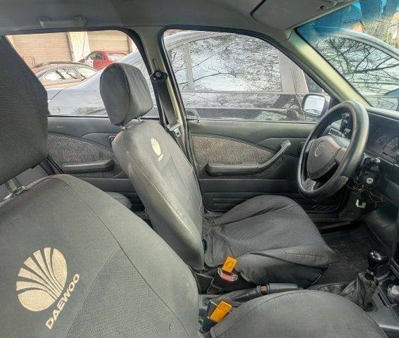 Сірий Деу Нексія, об'ємом двигуна 1.5 л та пробігом 350 тис. км за 1000 $, фото 3 на Automoto.ua