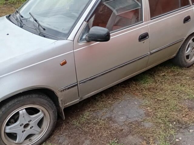 Сірий Деу Нексія, об'ємом двигуна 1.5 л та пробігом 1 тис. км за 1300 $, фото 1 на Automoto.ua