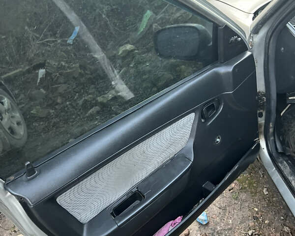 Сірий Деу Нексія, об'ємом двигуна 1.5 л та пробігом 130 тис. км за 1350 $, фото 7 на Automoto.ua