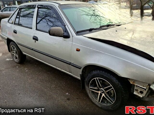 Сірий Деу Нексія, об'ємом двигуна 1.6 л та пробігом 180 тис. км за 1300 $, фото 12 на Automoto.ua