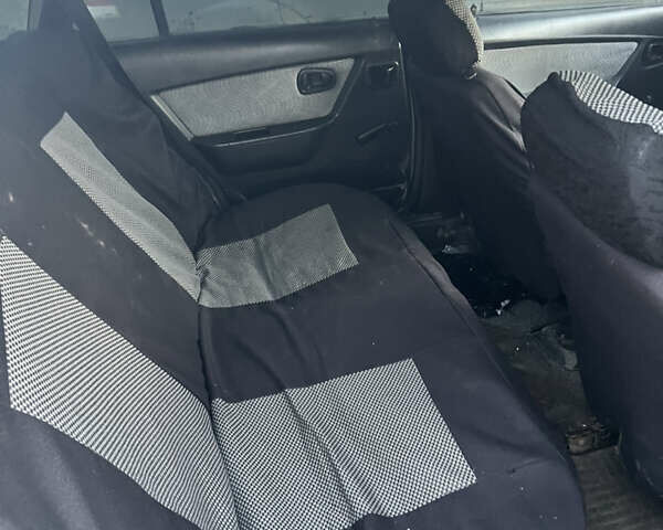 Сірий Деу Нексія, об'ємом двигуна 1.5 л та пробігом 130 тис. км за 1350 $, фото 10 на Automoto.ua