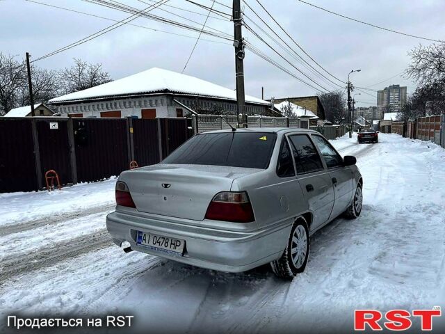 Сірий Деу Нексія, об'ємом двигуна 1.5 л та пробігом 240 тис. км за 1750 $, фото 6 на Automoto.ua