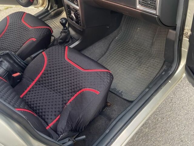 Сірий Деу Нексія, об'ємом двигуна 1.5 л та пробігом 129 тис. км за 3555 $, фото 9 на Automoto.ua