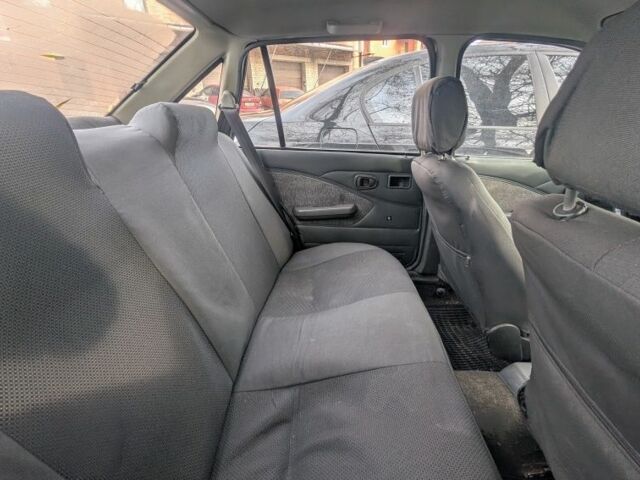 Сірий Деу Нексія, об'ємом двигуна 1.5 л та пробігом 350 тис. км за 1000 $, фото 4 на Automoto.ua