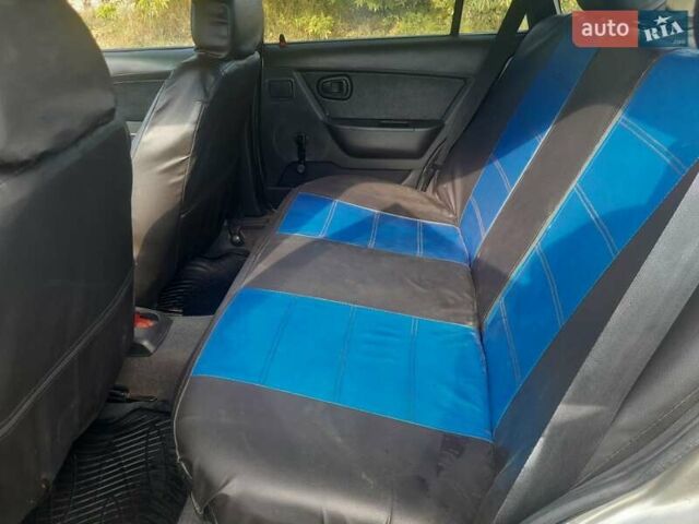 Серый Дэу Нексия, объемом двигателя 1.5 л и пробегом 300 тыс. км за 1750 $, фото 4 на Automoto.ua