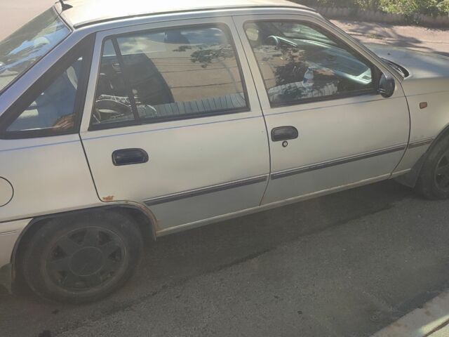 Серый Дэу Нексия, объемом двигателя 1.5 л и пробегом 271 тыс. км за 1300 $, фото 5 на Automoto.ua