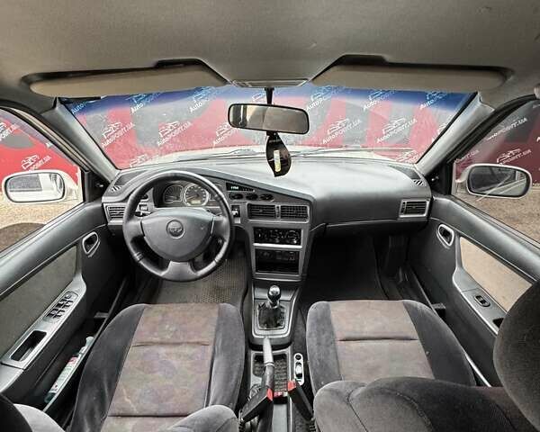 Сірий Деу Нексія, об'ємом двигуна 1.5 л та пробігом 141 тис. км за 2500 $, фото 13 на Automoto.ua