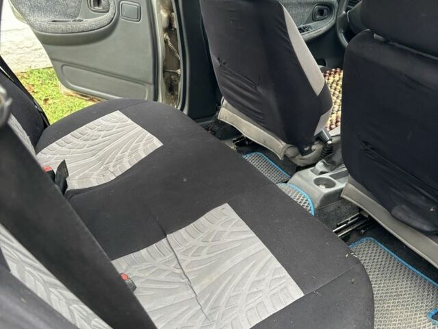 Сірий Деу Нексія, об'ємом двигуна 1.5 л та пробігом 246 тис. км за 2350 $, фото 3 на Automoto.ua