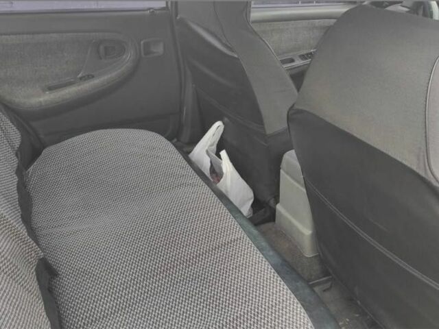 Серый Дэу Нексия, объемом двигателя 1.5 л и пробегом 121 тыс. км за 700 $, фото 1 на Automoto.ua