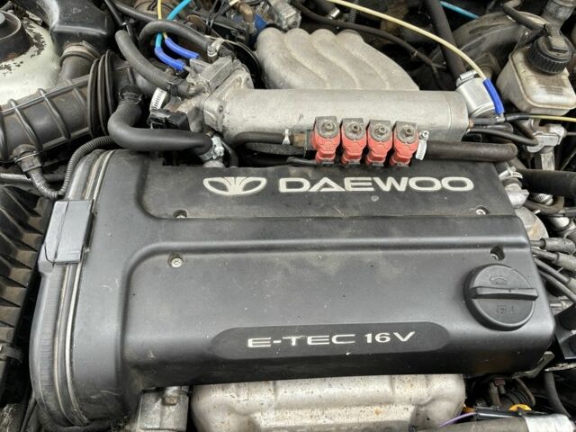 Сірий Деу Нексія, об'ємом двигуна 1.5 л та пробігом 246 тис. км за 2350 $, фото 4 на Automoto.ua