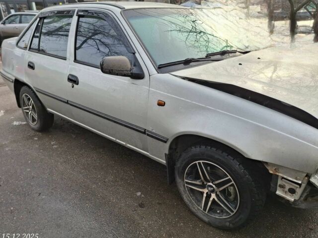 Серый Дэу Нексия, объемом двигателя 1.6 л и пробегом 180 тыс. км за 1600 $, фото 3 на Automoto.ua