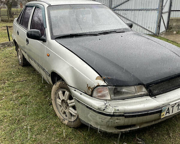 Сірий Деу Нексія, об'ємом двигуна 1.5 л та пробігом 228 тис. км за 1350 $, фото 1 на Automoto.ua