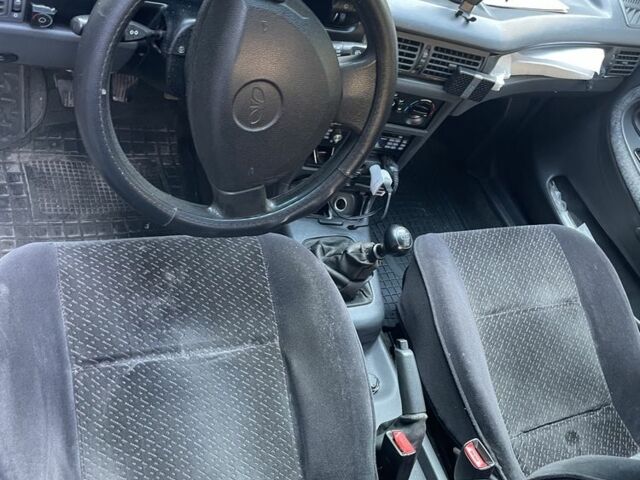 Серый Дэу Нексия, объемом двигателя 1.6 л и пробегом 245 тыс. км за 1900 $, фото 4 на Automoto.ua