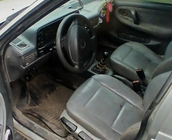 Сірий Деу Нексія, об'ємом двигуна 1.5 л та пробігом 249 тис. км за 714 $, фото 4 на Automoto.ua