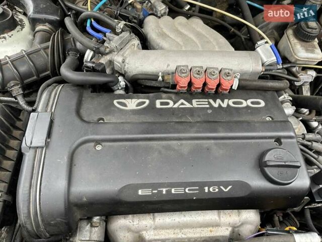 Сірий Деу Нексія, об'ємом двигуна 1.5 л та пробігом 246 тис. км за 2350 $, фото 5 на Automoto.ua