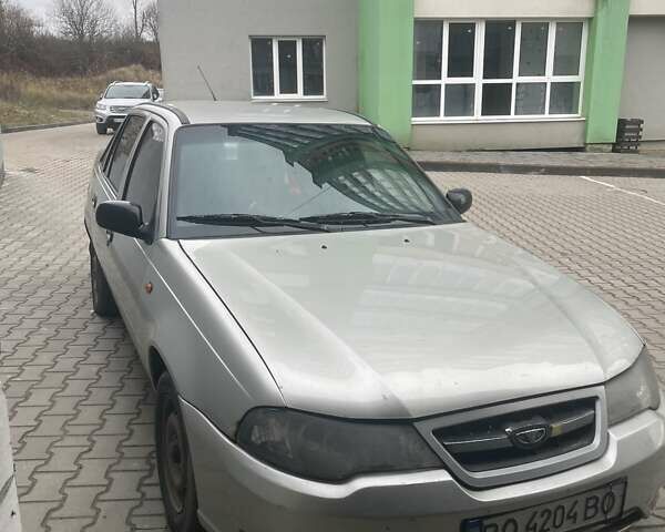 Сірий Деу Нексія, об'ємом двигуна 1.5 л та пробігом 152 тис. км за 2000 $, фото 3 на Automoto.ua