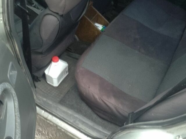 Серый Дэу Нексия, объемом двигателя 1.5 л и пробегом 288 тыс. км за 592 $, фото 5 на Automoto.ua