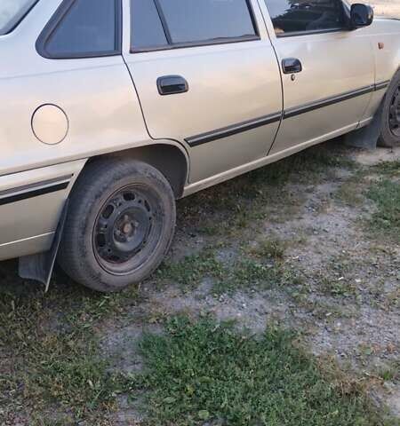 Сірий Деу Нексія, об'ємом двигуна 1.5 л та пробігом 208 тис. км за 1150 $, фото 3 на Automoto.ua